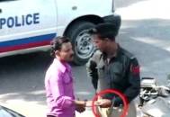 Police officer being bribe 